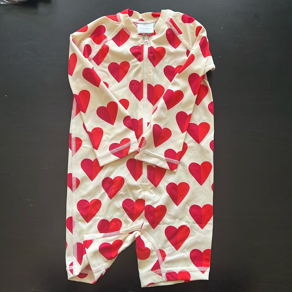 Hanna Andersson sweet heart sunblock rash guard swim suit.